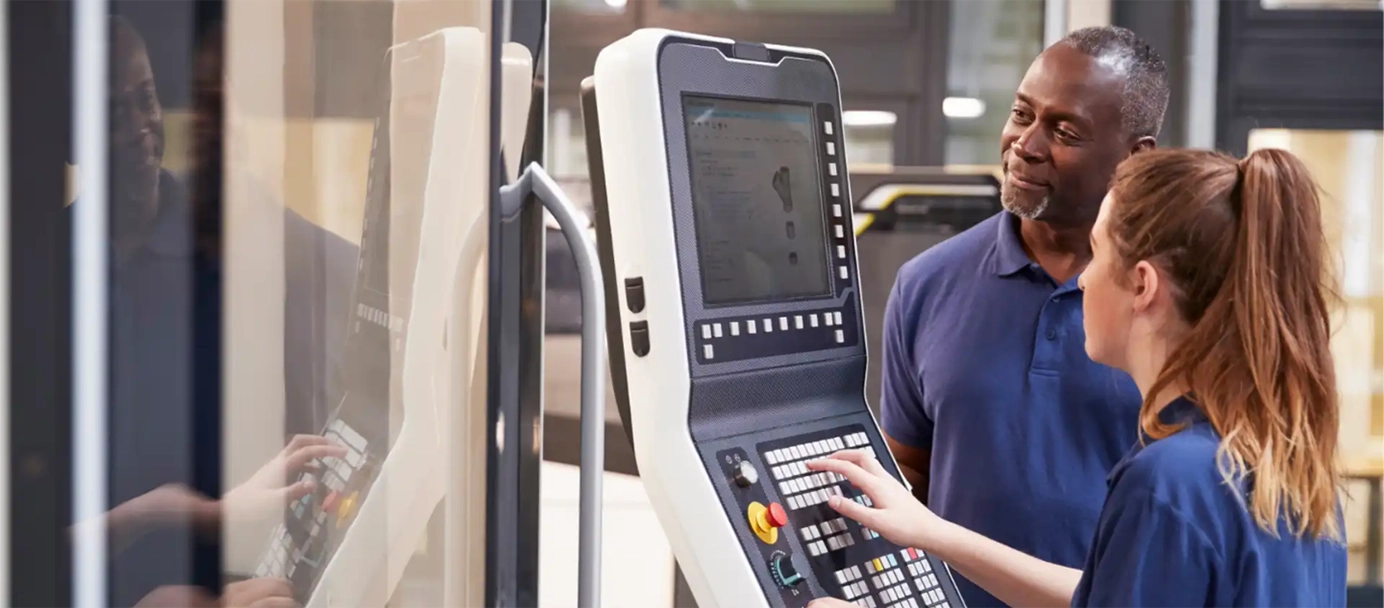 factory workers installing new software in factory